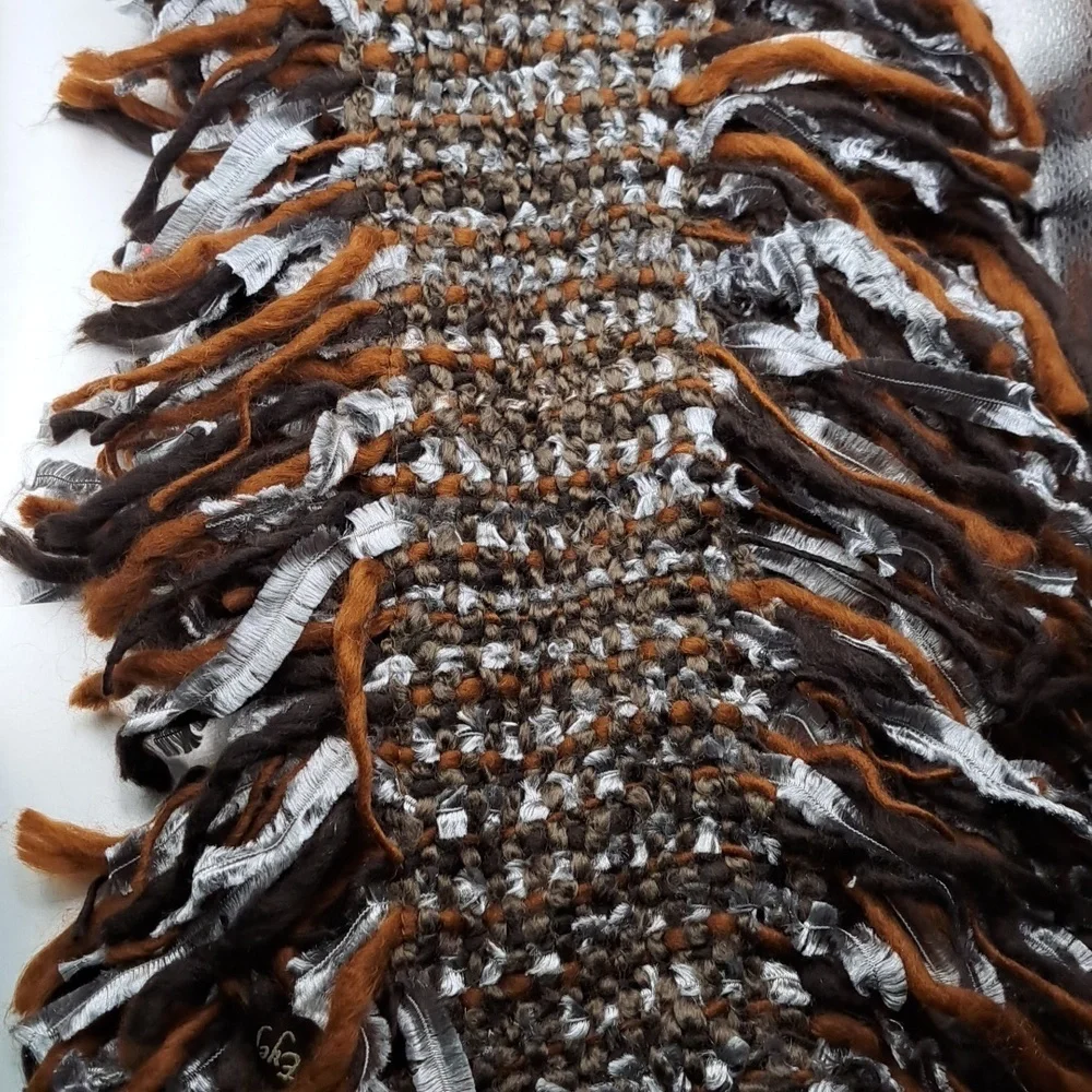 Eyeful Fringe Knit Scarf in Brown And Silver Has Faux Feather Detail